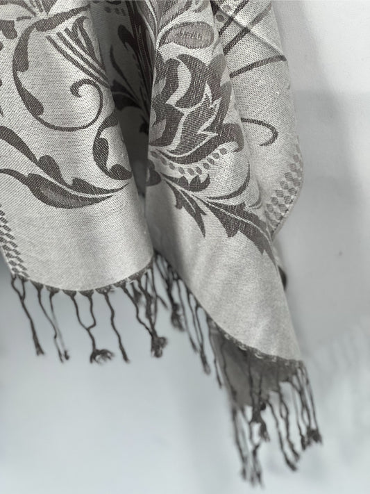 Silver Shawl, Pashmina Wrap, Fringe Detail, Floral Pattern, Elegant Scarf, Soft Accessory, Gray Embroidery, Luxe Drapery, Chic Cover-up, Winter Fashion, Sophisticated, Timeless Style, Versatile Wear