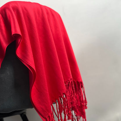 Red Shawl, Pashmina, Cashmere-Feel, Elegant Tassels, Timeless Elegance, Bold Red, Soft Wrap, Luxurious Warmth, Versatile Style, Vibrant Color, Sophisticated Accessory, Quality Craftsmanship, Wardrobe Staple