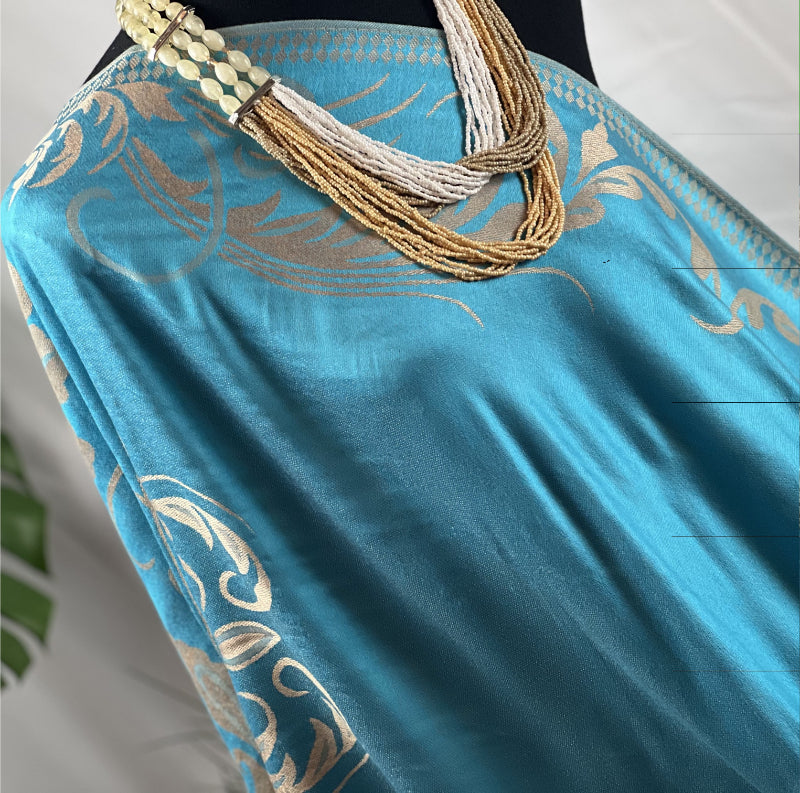 Aqua Pashmina, Gold Detail, Fringed Shawl, Elegant Wrap, Soft Drapery, Luxurious Feel, Chic Accessory, Turquoise Shawl, Metallic Accent, Fashion Scarf, Versatile Wear, Sophisticated, Lightweight Wrap