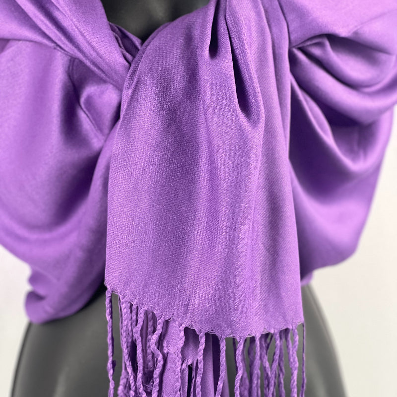 Purple Shawl, Pashmina, Cashmere-Feel, Elegant Fringe, Luxurious Wrap, Classic Accessory, Versatile Style, Deep Purple, Soft Warmth, Sophisticated Look, Quality Fabric, All-Season Comfort, Fashion Staple