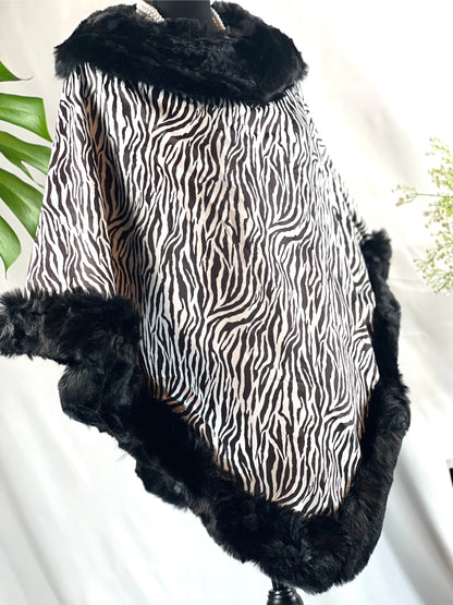 Zebra Poncho, Faux Fur Wrap, Suede Cape, Animal Shawl, Chic Poncho, Fur Trim Cape, Bold Zebra Wrap, Soft Faux Suede, Trendy Shawl, Black White Cape, Luxe Poncho, Statement Wrap, Elegant Coverup