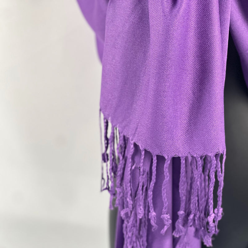 Purple Shawl, Pashmina, Cashmere-Feel, Elegant Fringe, Luxurious Wrap, Classic Accessory, Versatile Style, Deep Purple, Soft Warmth, Sophisticated Look, Quality Fabric, All-Season Comfort, Fashion Staple