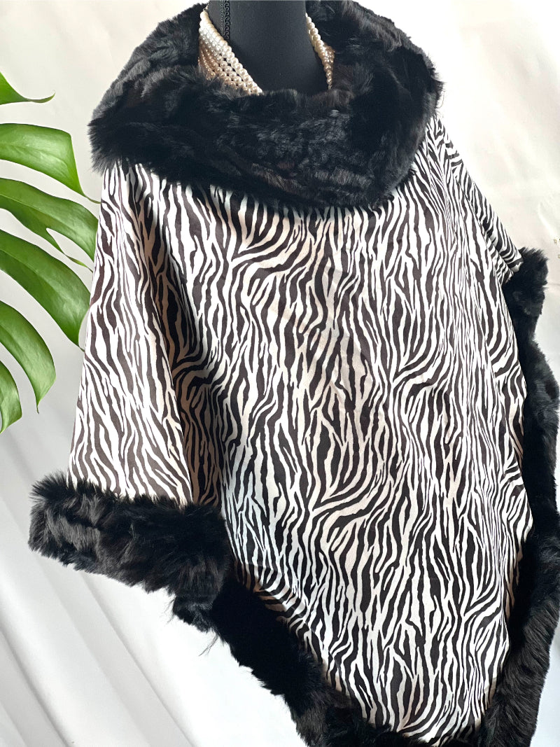 Zebra Poncho, Faux Fur Wrap, Suede Cape, Animal Shawl, Chic Poncho, Fur Trim Cape, Bold Zebra Wrap, Soft Faux Suede, Trendy Shawl, Black White Cape, Luxe Poncho, Statement Wrap, Elegant Coverup